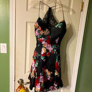 B. Smart black floral cocktail party dress size 9 flirty full skirt side pockets